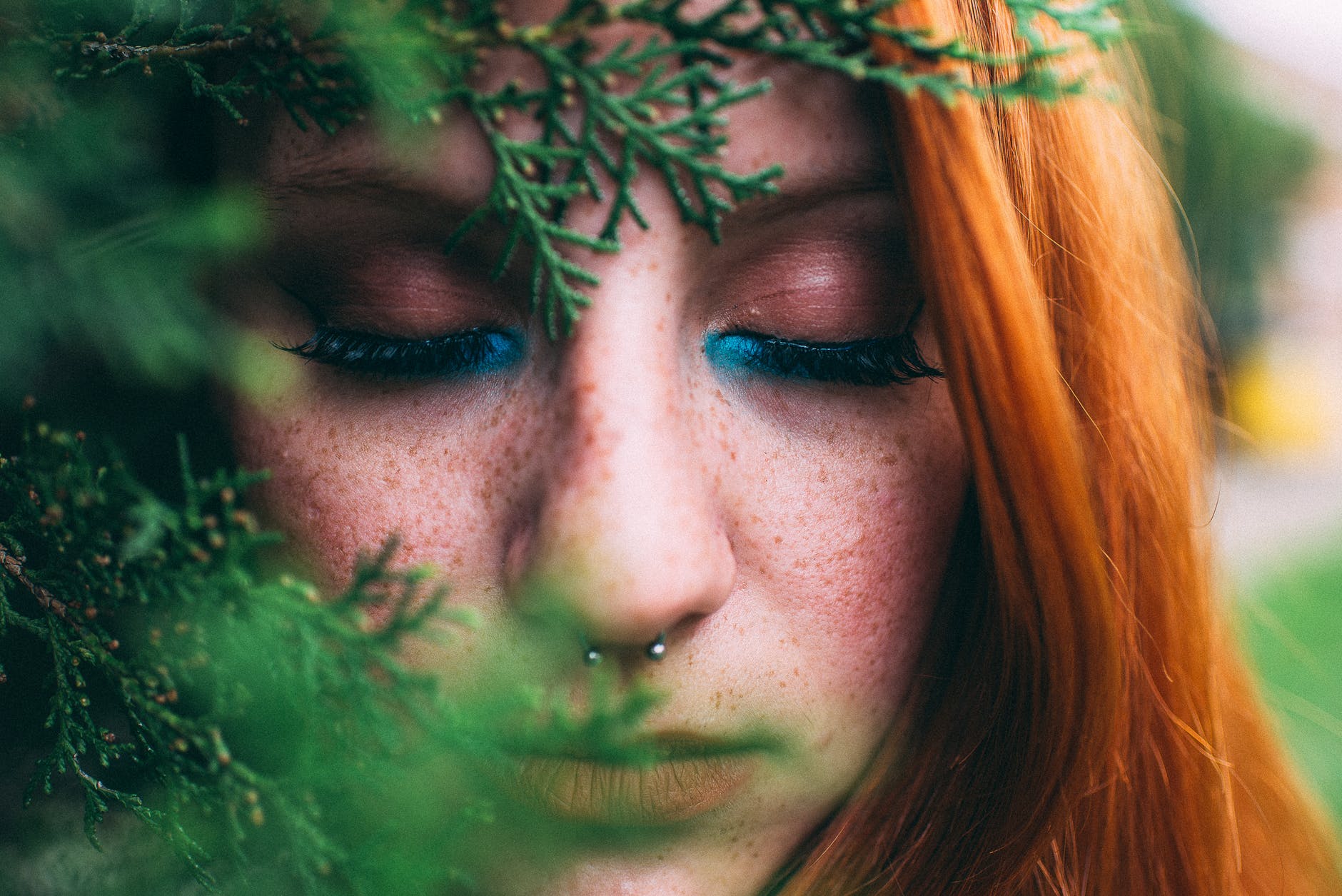 woman closing her eyes